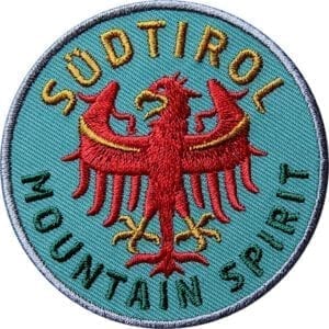Südtirol Adler Patch in Oliv-Grün. Aufnäher von Club of Heroes. Hochwertig gestickte Patches wie Aufbügler Bügelbilder Bügelflicken zur Veredelung von Textilien, zum Aufbügeln oder Aufnähen auf Jacken, Kleidung.